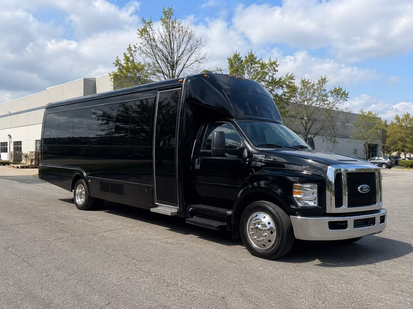 Group beside a Mercedes Sprinter limo in Plano